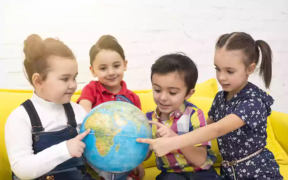 children-group-with-globe